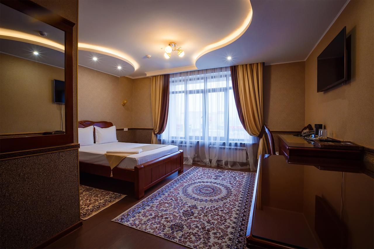 Salut Hotel Almaty Bagian luar foto