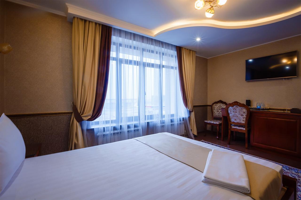 Salut Hotel Almaty Bagian luar foto